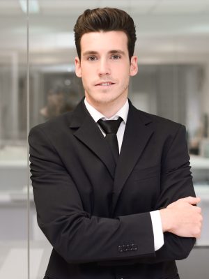Portrait of a young businessman in an office